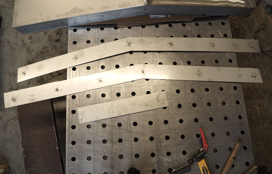Side parts of a plaque before assembly.